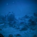 Vue de la surface de l’épave avant la fouille (vidéo prise par le ROV).  (Cliché L.Long, © L.Long/DRASSM)  